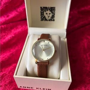 J126 NWT Anne Klein Gold watch with White face & Brown Leather Strap